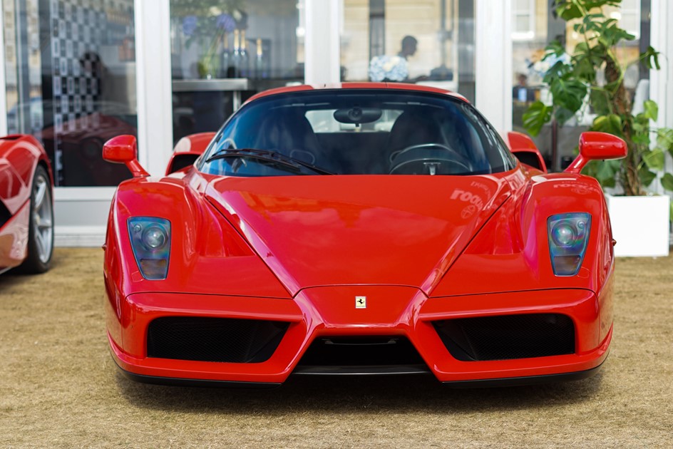 A head-on shot of a Ferrari Enzo presented as part of Lockton Performance's big five display