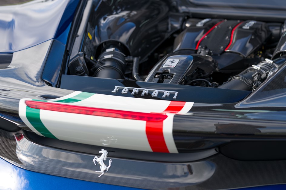 The Ferrari 488 Pista Piloti's V8 engine with prancing horse logo