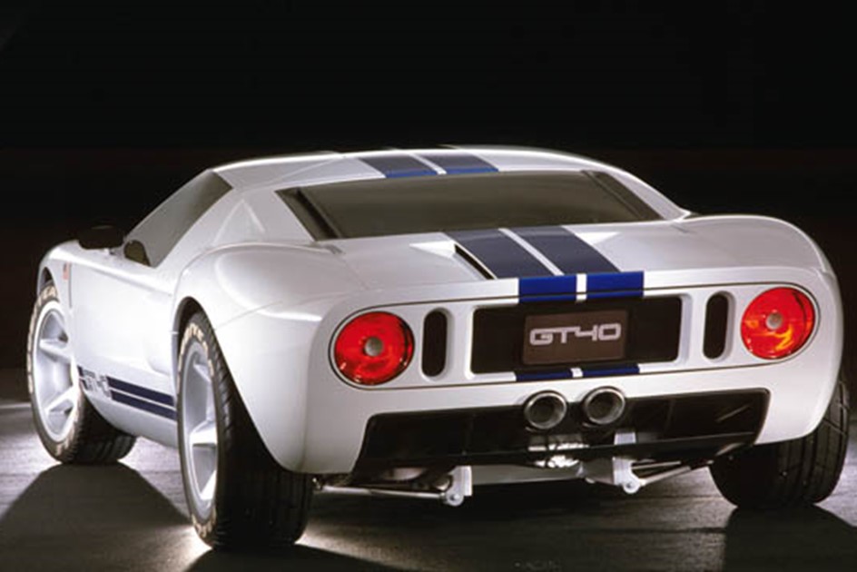A white Ford GT with blue stripes